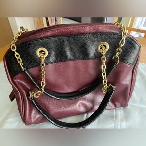 Kellie & Katie merlot and black faux leather purse with leopard print interior